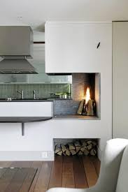 Penthouse In Aker Brygge Norway With Open Fireplace In Kitchen Barefootstyling Com Modeles De Cheminee Cheminee Moderne Cuisine Moderne