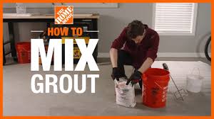 Pour a quart to half gallon of grout on the tiles. How To Mix Grout Tile Projects The Home Depot Youtube