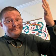 Dominik Mysterio shows off his new chest tattoo that has similarities to  Rey Mysterio's #dominikmysterio #reymysterio #wwe