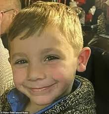 Ohio Pastor and his two sons, aged 17 and 10, die 'holding onto each other'  after he saved his wife and other four children from house fire