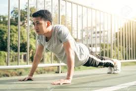 The morning yoga moves you need to start your day. Fitness Sport Men Fashion Sportswear Doing Yoga Fitness Exercise In Street Fit Young Asian Man Doing Training Workout In Morning Young Happy Asian Man Stretching At Park After Running Workout Stock Photo