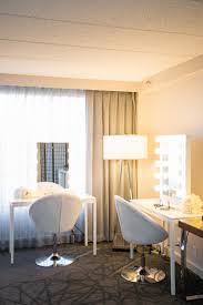 Shoes, earrings and her engagement ring. 5 Reasons A Hotel Room Is Perfect For Getting Ready Minnesota Bride