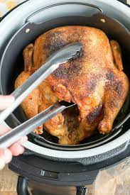 A whole, unstuffed chicken should be roasted for 1 hour and 40 minutes, while a whole stuffed chicken should be roasted for 2 hours and 10 minutes. Air Fryer Whole Chicken Ninja Foodi Whole Chicken