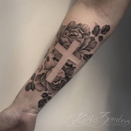 Negative space tattoo by @kostazombostattoos • • • Email the studio for all bookings and enquiries eastsideringwood@gmail.com • • • #crosstattoo #flowertattoo #blackandgreytattoo #melbournetattoo