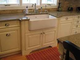 farm sink and granite countertop