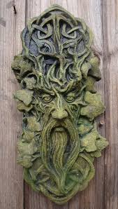 Green men are usually found on religious buildings but not always: Garden Statues And Ornaments