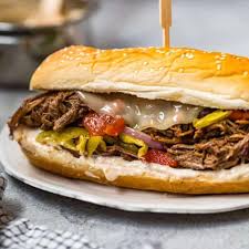 Add in the onions and the carrots, along with the fresh herbs. Slow Cooker Italian Beef Sandwiches Leftover Roast Recipe Idea