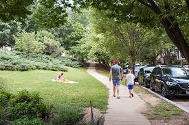 On a weekend evening, the lawn is full with groups picnicking, people playing basketball on the courts and kids climbing on the two playgrounds with the backdrop of tall apartment buildings. Kalorama Washington Dc Neighborhood Guide Compass