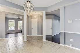 Chair rail moulding is a great way to spruce up a room and protect its walls from wily and dangerous chair backs. Color Scheme Gray Brown Dark Wood Flooring And Tile Darker Shade Chair Rail Dark Wood Floors Wood Shades Color Schemes Gray