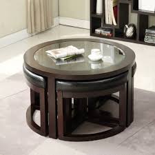 It is upholstered with leather and finished with decorative quilting. Round Coffee Table Ottomans Underneath Architecture Design Facebook