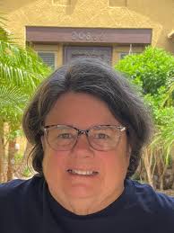 Gorgeous lite Carmel face frame with long layered curtain bangs