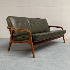 The economy is tough and watching our dollar is more important than ever. Mid Century Green Leather Teak Sofa From Casala Germany 1950s 155579