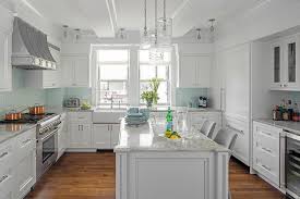 A perfect weekend project for beginners, adding a tile backsplash is one of the fastest and least expensive ways to give your kitchen a stylish new look. Aqua Blue Glass Subway Backsplash Tiles Transitional Kitchen