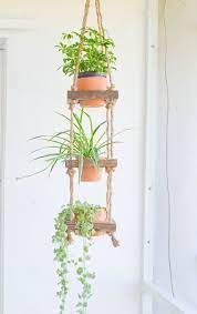 This is what makes each piece unique. Rustic Hanging Planter 3 Tier Hanging Planter By Archerhomedesigns Hanging Plants Diy Plant Stand Hanging Plants Diy