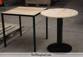 horeca tafels vierkant en rond van nieuw eiken het stalen onderstel heeft een zwarte poedercoat industrieel horeca horecainspiratie tafels meubels tafel
