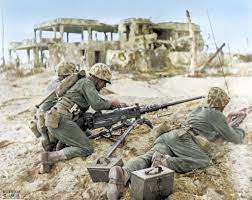 WW2 Colourised Photos - Three US Marines, one loading an M2 Browning .50  caliber machine gun. Roi-Namur, Kwajalein Atoll. 1 February 1944 “Tempus  Fugit but leathernecks keep pace – No time was