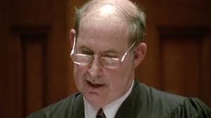 Who is Lynn Adelman -- the federal judge presiding over the Dugan case?