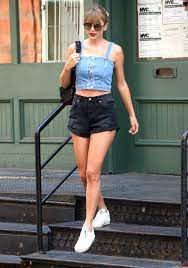 Taylor swift in a tight pink top. Taylor Swift S Genius Trick To Pulling Off Denim On Denim Get Her Look Entertainment Tonight