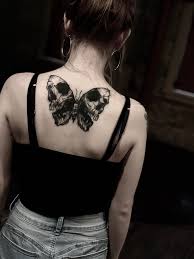 Unusual combined by michele zingales upper arm tattoo of human skull with butterfly wing. Half Fresh Half Healed Shot Of This Skull Butterfly I Finished This Week Tattoo