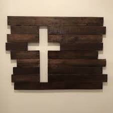 This decorative faux window pane features a brown ached frame with black metal bars placed over top in a lovely design just like a classic church window. Rustic Wooden Cross Wood Wall Art Diy Wooden Crosses Diy Wood Crosses Diy