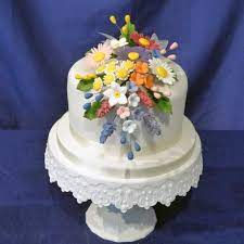 Learn more about sugar flowers and the right tools that would help you create stunning florist wires are not safe to be in contact with food unless they are covered with food safe materials. Sugarcraft Flowers Sugar Flowers Handmade In A Wide Range Of Colours For Decoration Wedding And Celebration Cakes