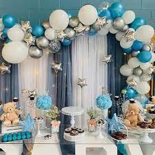 Here, the hosts have accented their hanging vines with a gold sign to punch up the display. Pin By Lula Ramos On Eventi Idee In 2021 Moon Baby Shower Boy Baby Shower Themes Baby Shower Balloons