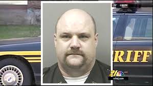 Trumbull deputy suspended over racist post