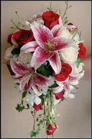 Wedding bouquets with stargazer lilies and roses. Stargazer Lilies Red And White Roses Dendrobium Orchids Flower Bouquet Wedding Red Bouquet Wedding White Wedding Bouquets