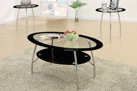 Keep your guests guessing as they appreciate the unique style and presence of this bistro set. 3 Piece Coffee Table Set With Black Glass And Metal Legging