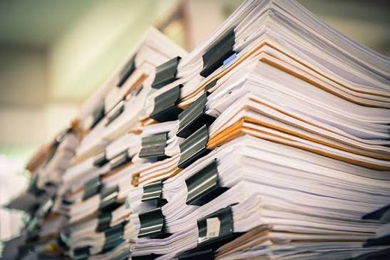 Securely access legal documents remotely with our scanning services.