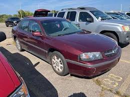 Image result for Medium Green 2002 Impala