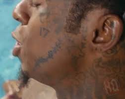Lil wayne's face tatoos and their meanings. Dow Hokoana Talks Tattooing Lil Wayne S Genital Area Bum