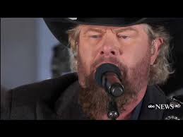 The Unabashed Meaning Behind Toby Keith's Patriotic Hit "Courtesy of the  Red, White, and Blue (The Angry American)"