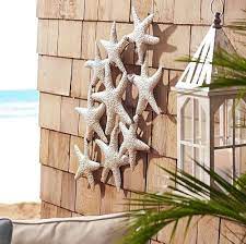 The lustrous bronze and golden hues are achieved through a heat patina on stainless steel. Outdoor Coastal Wall Art Decor Metal Art Canvas Art More Exterior Wall Art Outdoor Metal Wall Art Metal Wall Art Decor