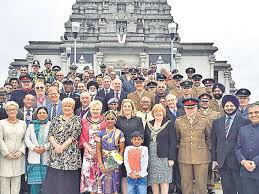 British soldiers tie rakhis to ...