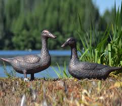 A garden ornament is an item used for garden, landscape, and park enhancement and decoration. Pair Of Ducks Metal Garden Ornaments Gardensite Co Uk