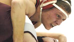 Holiday wrestling, swim tourneys