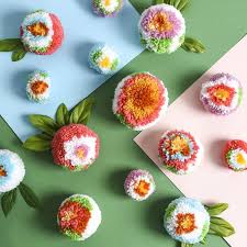 Whether styled on the sofa or wrapped around your shoulders, it's a cozy layer you'll love year round. Flower Pom Poms On Behance