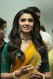 She made her film debut with uppena (2021). Actress Krithi Shetty Half Saree Photos Stills