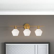 Size the fixtures to the scale of the room and width of the sink and counter. Breakwater Bay Lakeville 3 Light Dimmable Vanity Light Finish Br In 2021 Modern Bathroom Light Fixtures Contemporary Bathroom Lighting Modern Bathroom Vanity Lighting