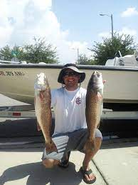 Sporting Fishware Apparel With Two Nice Redfish Www Saltyscales Com Performance Fishing Apparel Fishing Shirts Red Fish