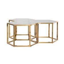 This coffee table features a chrome finish and clear glass tabletop. Penta Set Of 3 Hexagon Gold Coffee Table Home Story Richmond Interiors
