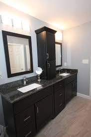 Like any room in the house, the bathroom can benefit from a makeover every once in awhile. Dark Bath Cabinets By The Bath Remodeling Center Llc