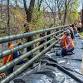 Volunteer Rail Painting on the Woonasquatucket River Greenway