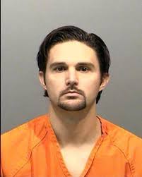 3 charged in business information-theft case