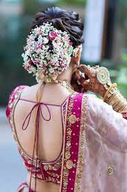 8 Gorgeous Floral Buns For Brides Who Love Everything Extravagant Bridal Hairstyle Indian Wedding Bridal Hair Buns Indian Bridal Hairstyles