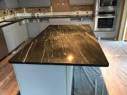 This beautiful black kitchen by april tomlin interiors is brimming with edgy ideas. Add Luxury To Your Kitchen With Black Marble Countertops Moreno Granite