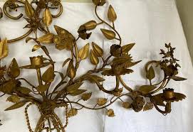 The piece also comes with one sleek rectangular long mirror on its background. Antique Gilt Metal 5 Candle Floral Wall Sconce For Sale At 1stdibs