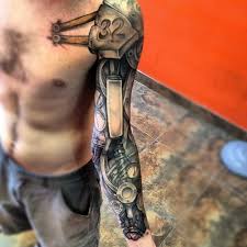 Skilled artists use colors, blend the image into your skin and the results are incredible. Cool Iron Robot Arm Tattoo With Shoulder Strap Tattooimages Biz