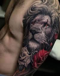 Black And White Lion Tattoo Sleeve Tattoo Designs 2018 2019 Majestic Black And White Lion With Red Rose Tattoodesigns Mens Lion Tattoo Lion Head Tattoos Lion Arm Tattoo